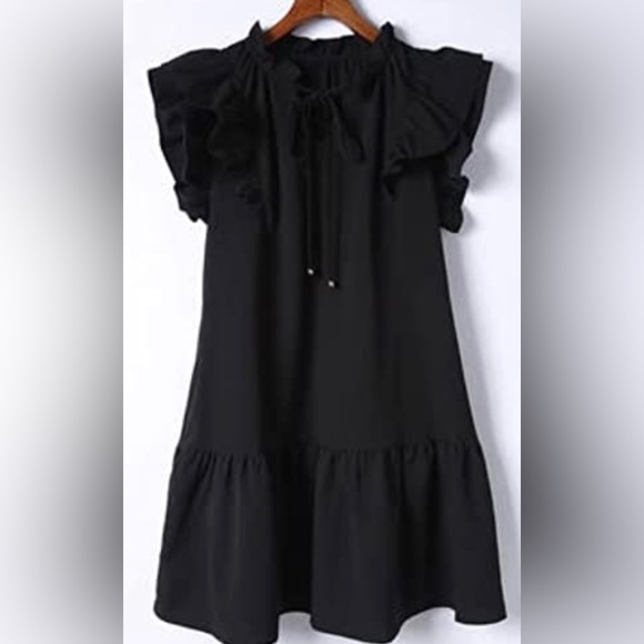 Summer dress with elegant ruffle design. - Picture 1 of 4